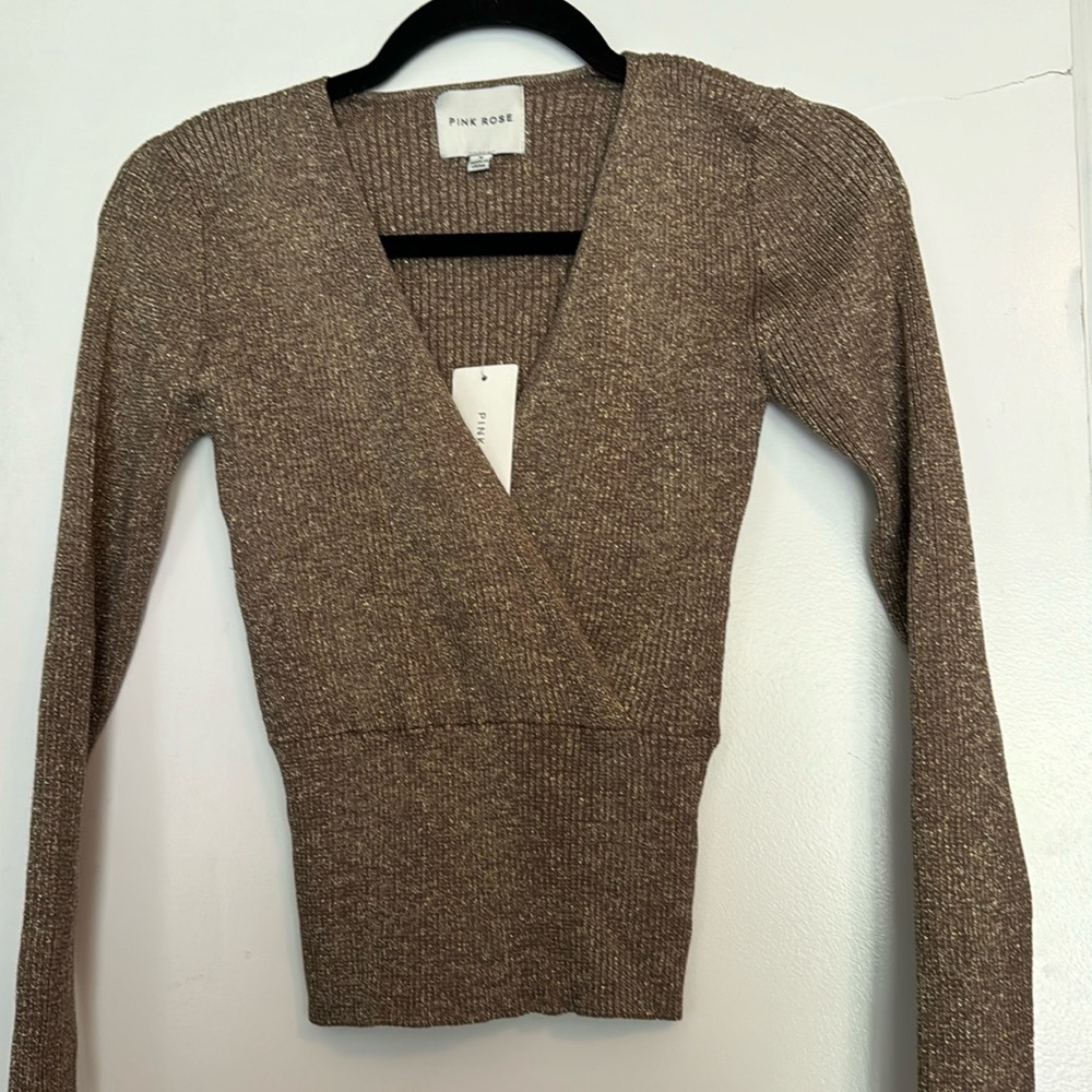 New with tags! Small mocha colored glittery shirt.